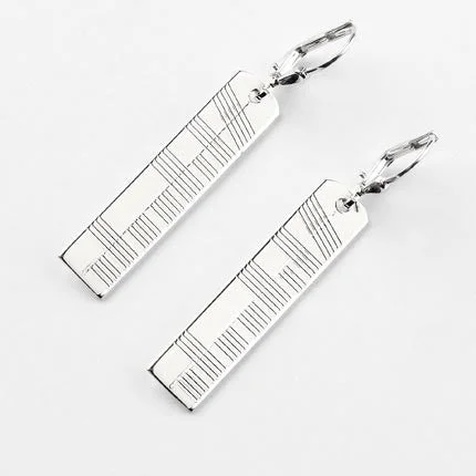 emerald-cut ruby eternity ring Ogham Silver Earrings