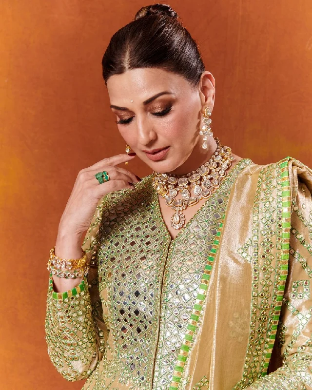 modern geometric earrings gold Sonali Bendre - Ruchika Emerald Ring